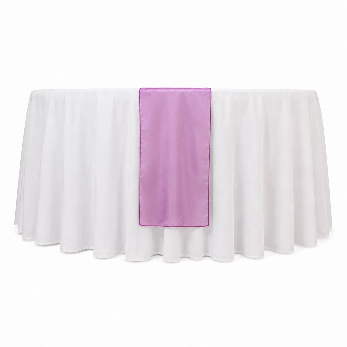Fuchsia sheer organza table runner on a white table