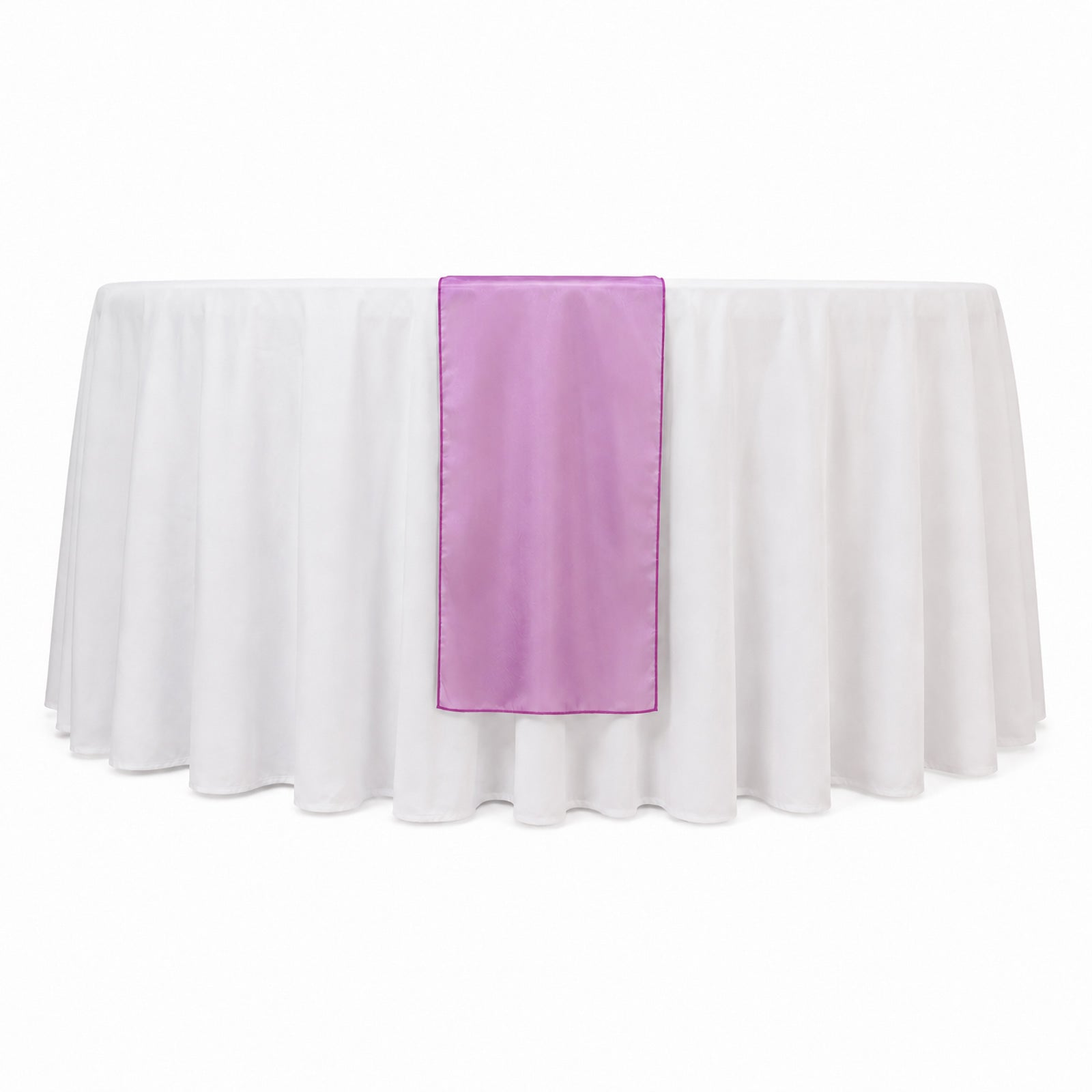 Fuchsia sheer organza table runner on a white table