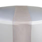 Peach sheer organza table runner on a round table.