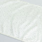 Pearl white scuba table runner with rhinestone accents.
