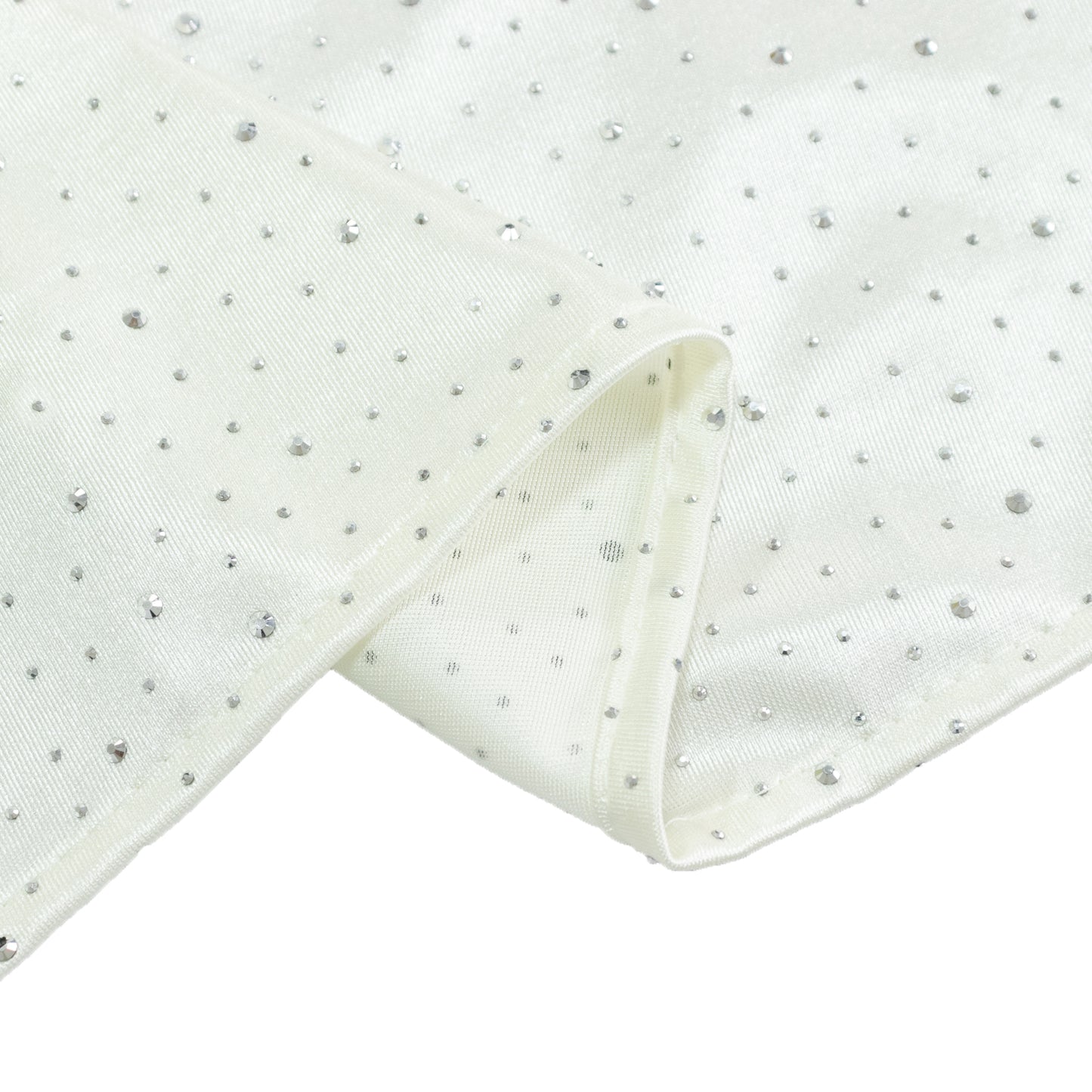 Pearl white scuba table runner with rhinestone accents and a wrinkle-free finish.