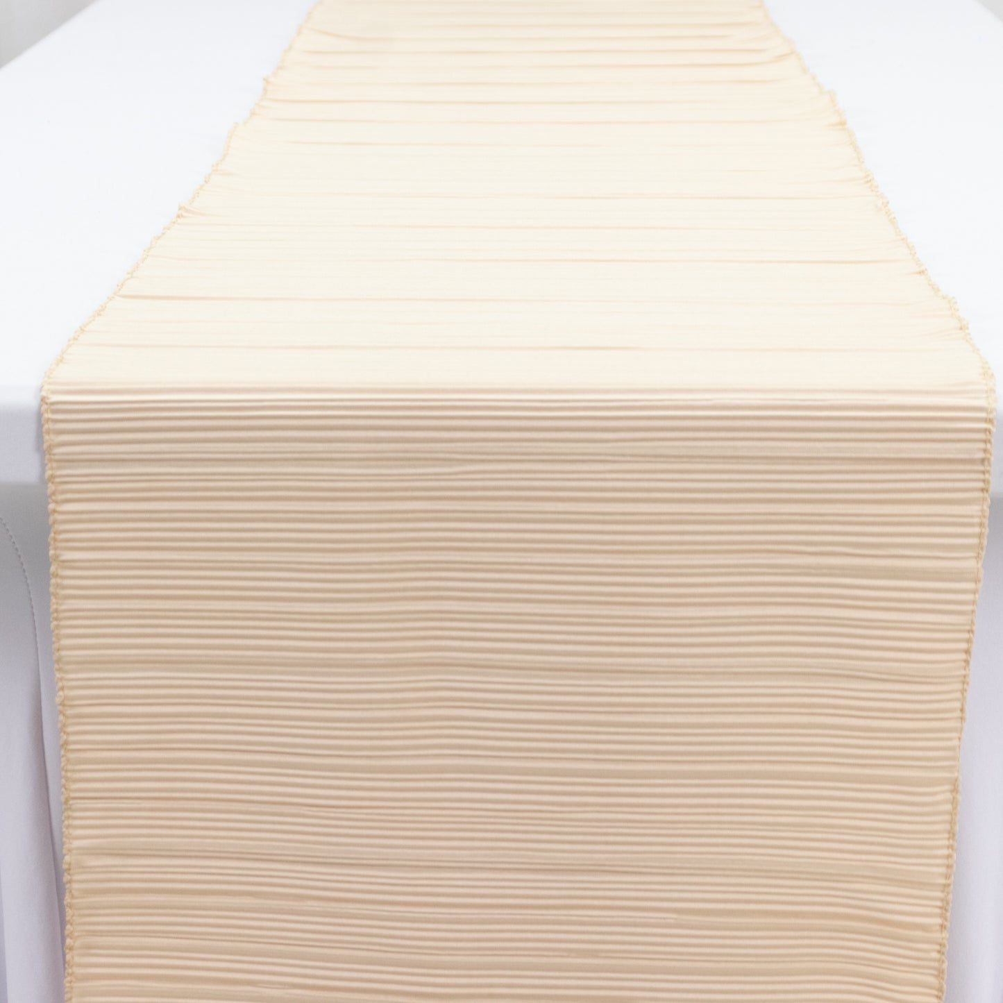 Beige accordion pleated scuba table runner, 12" x 108", wrinkle-free and stain-resistant.