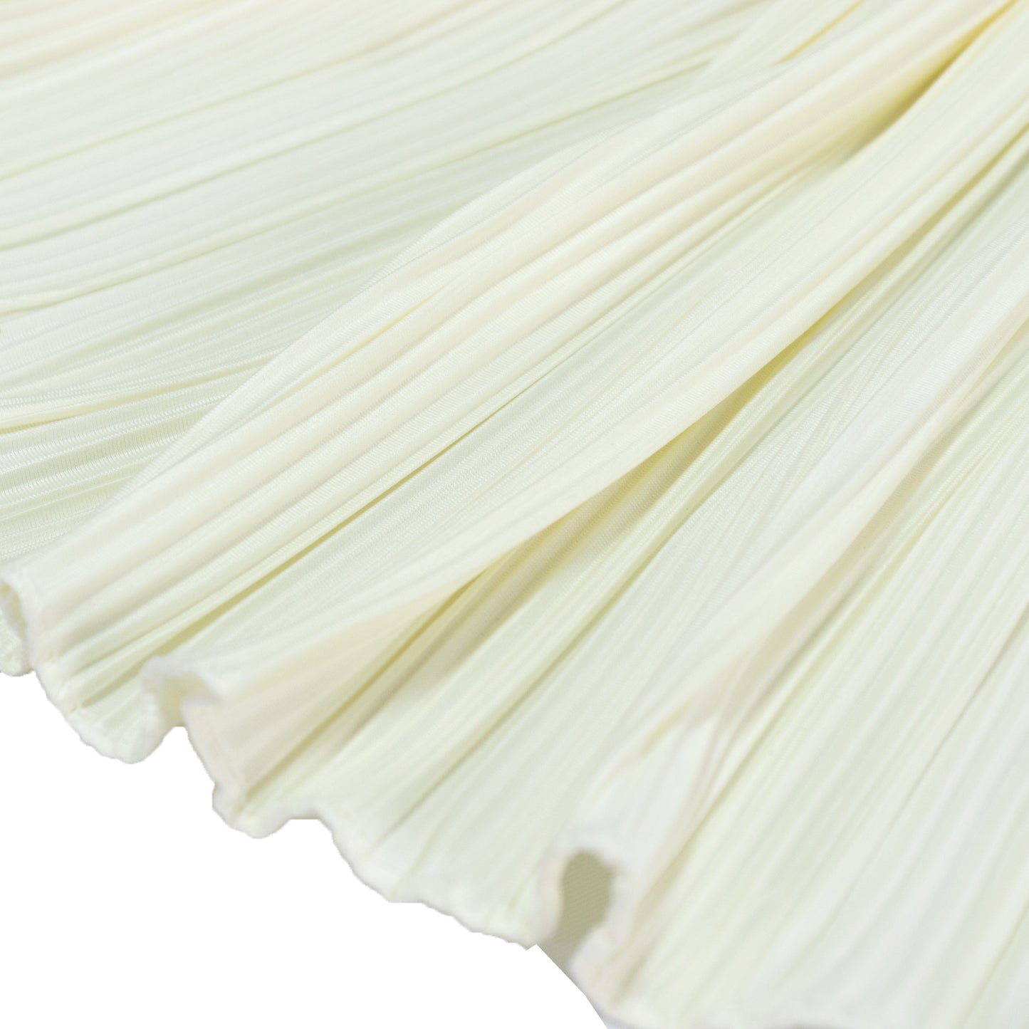 Ivory accordion pleated table runner, wrinkle-free and stain-resistant.