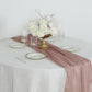 Rose gold sparkling glitter gauze table runner on a dining table.