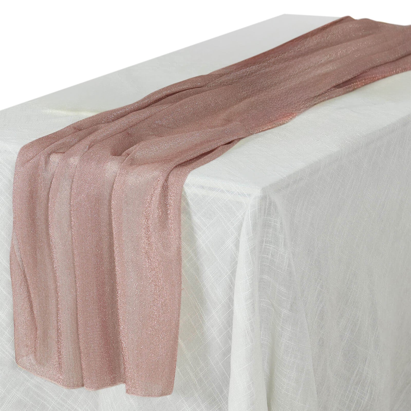 Rose gold sparkling glitter gauze table runner on a white table.
