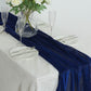 Royal blue sparkling glitter table runner on a white table setting.