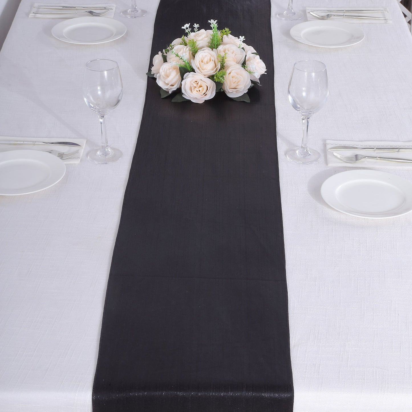 Black shimmer sequin table runner for elegant dining settings.