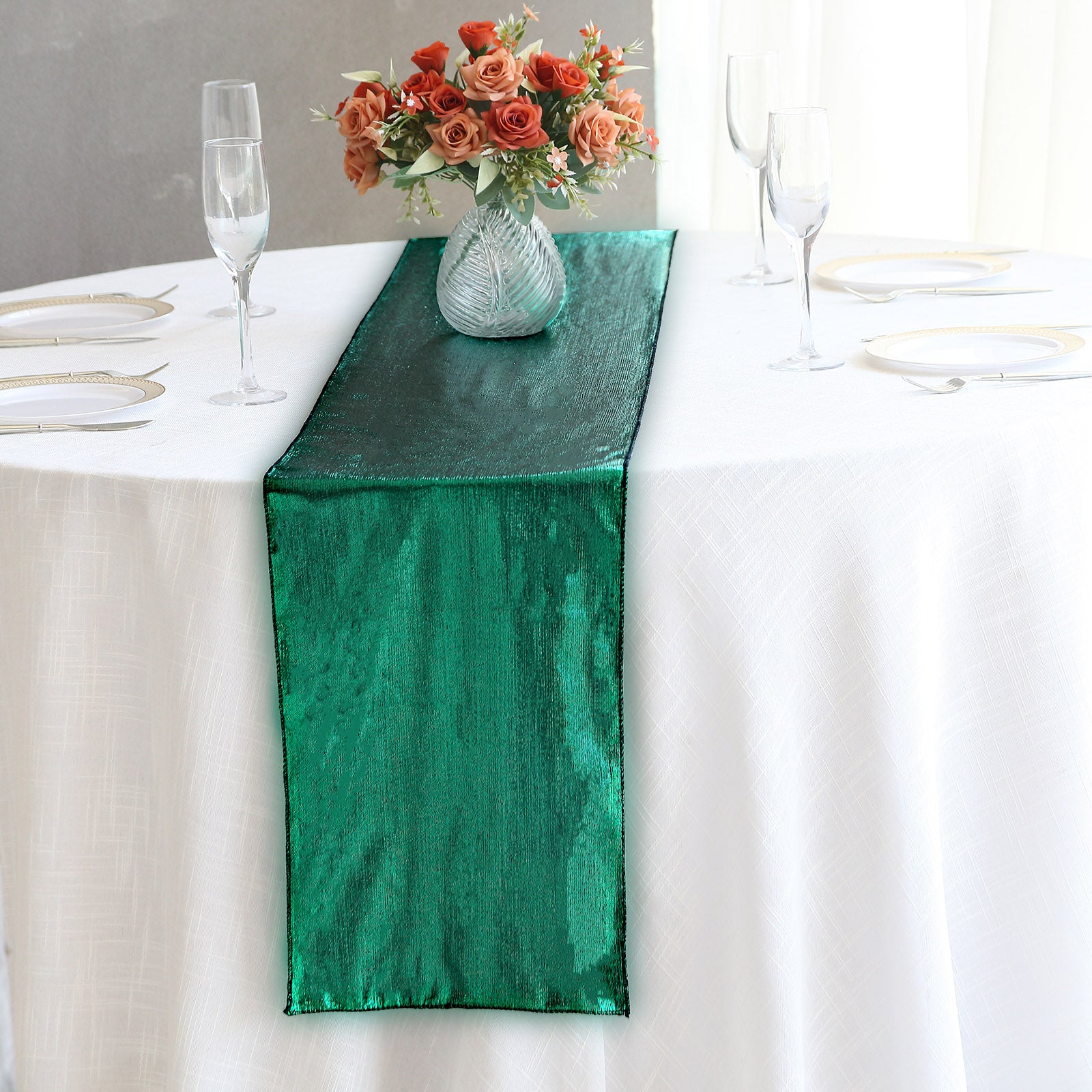 12"x108" Hunter Emerald Green Shimmer Sequin Dots Table Runner on a white table.