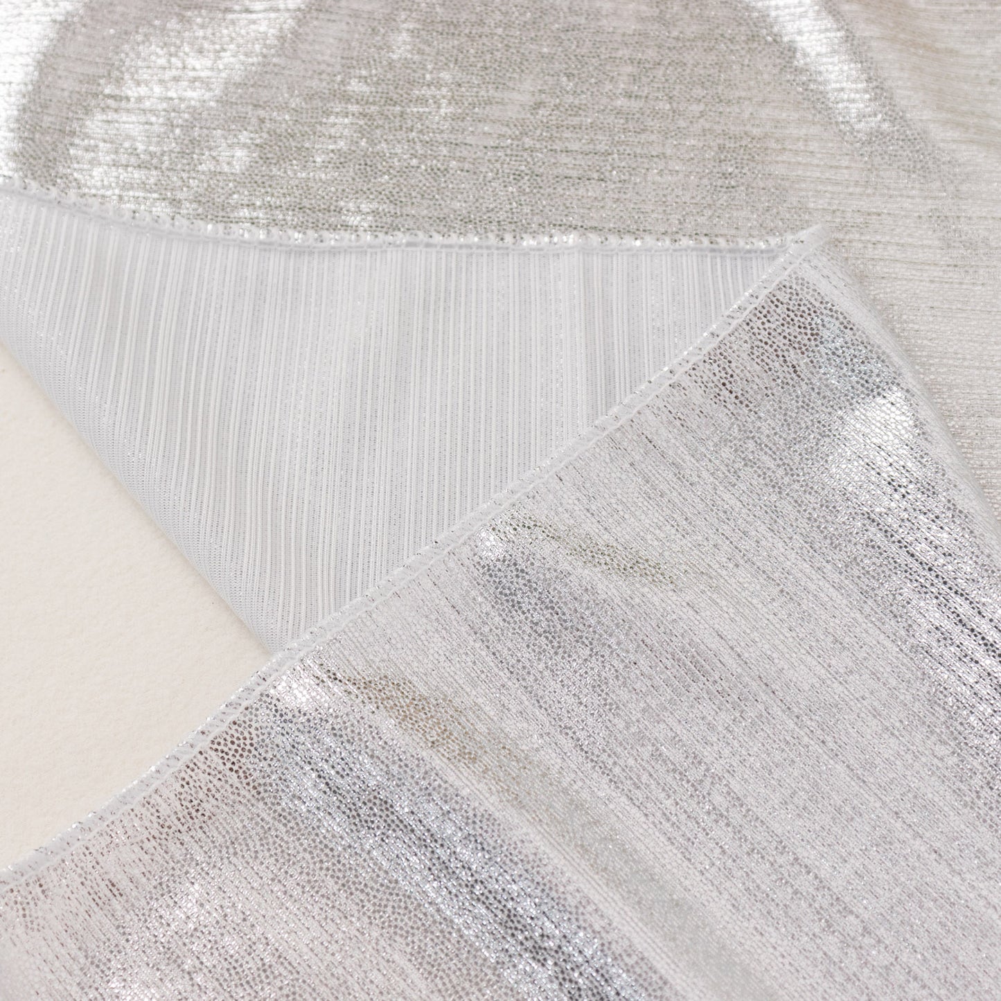Silver shimmer sequin dots table runner, wrinkle-free and sparkling.