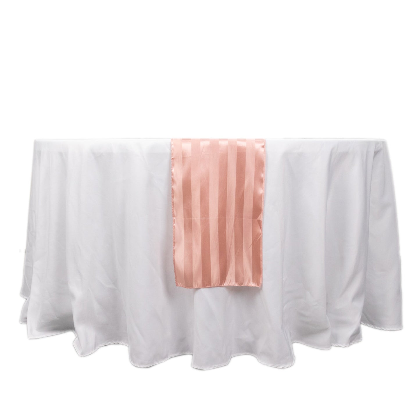 Dusty rose satin stripe table runner on a white tablecloth.