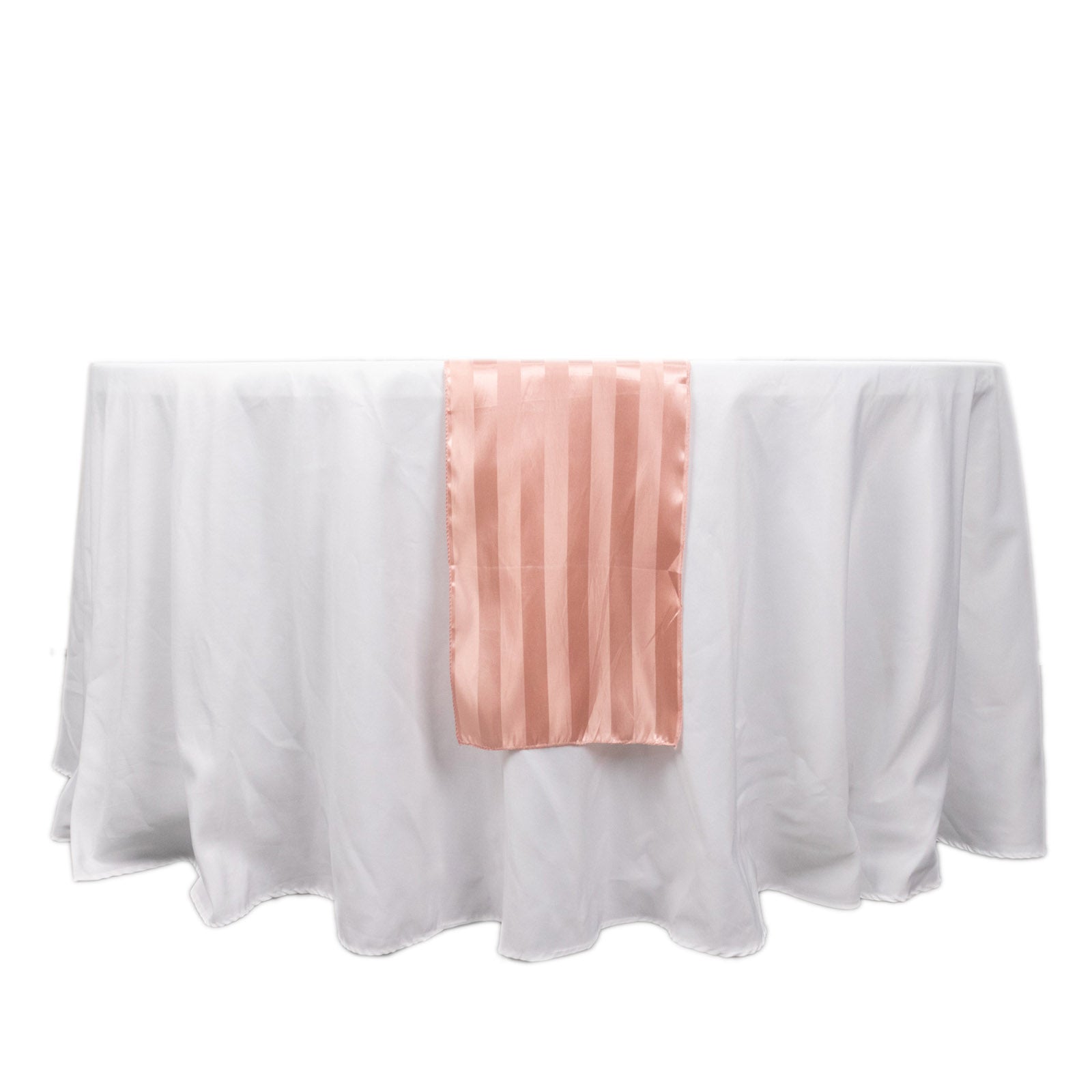 Dusty rose satin stripe table runner on a white tablecloth.