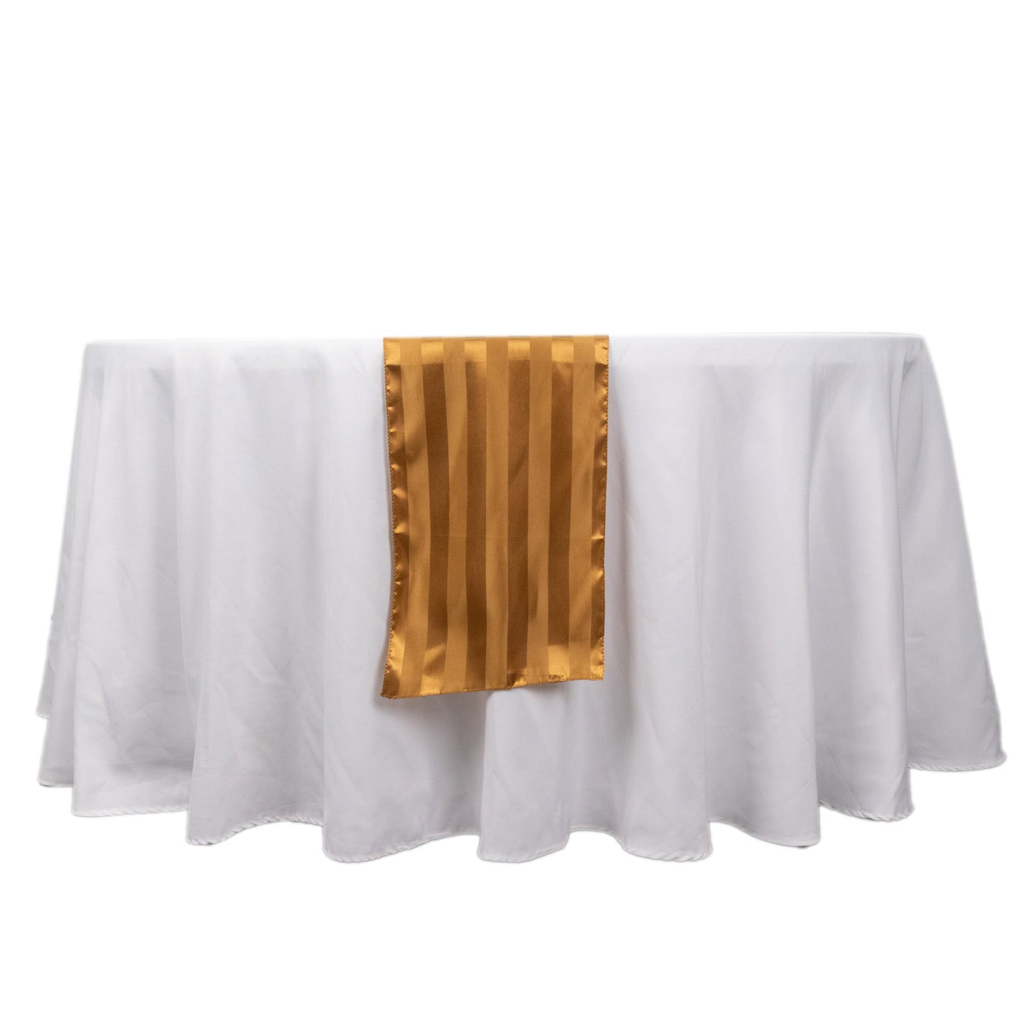 Gold satin stripe table runner on a white tablecloth.