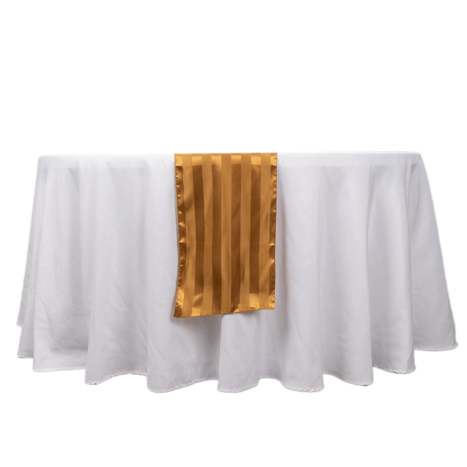 Gold satin stripe table runner on a white tablecloth.