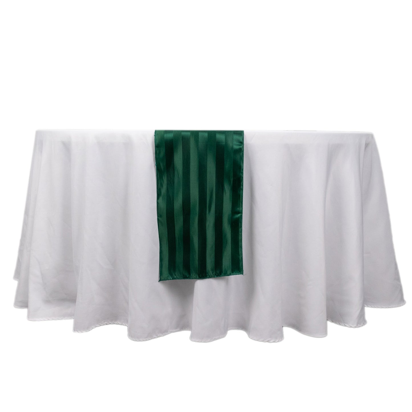 Hunter emerald green satin stripe table runner on a white tablecloth.
