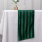 Hunter emerald green satin stripe table runner on a white table.