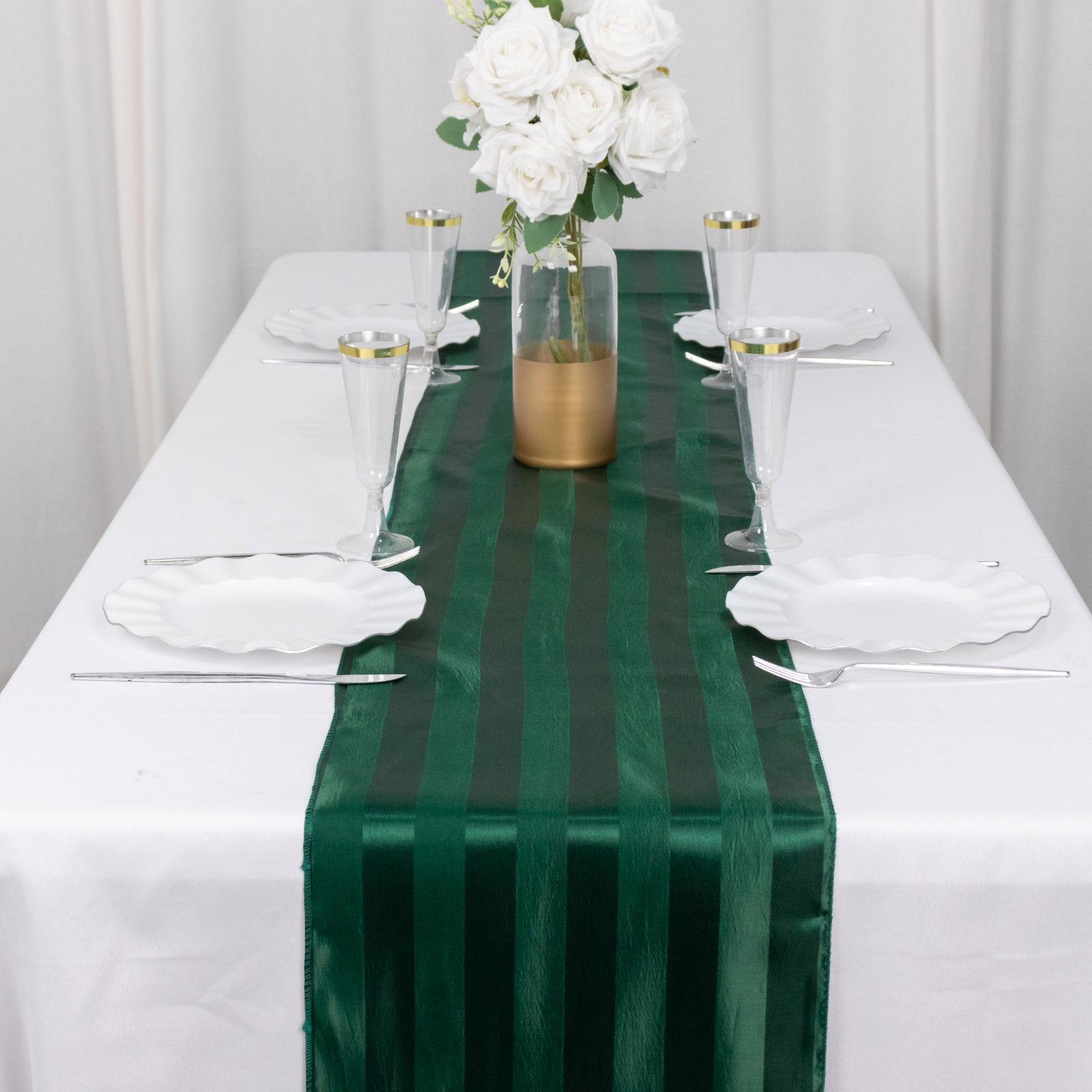 12"x108" Hunter Emerald Green Satin Stripe Table Runner on a white table.