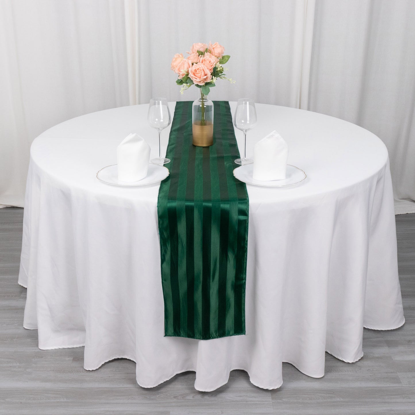 12"x108" Hunter Emerald Green Satin Stripe Table Runner on a round table.