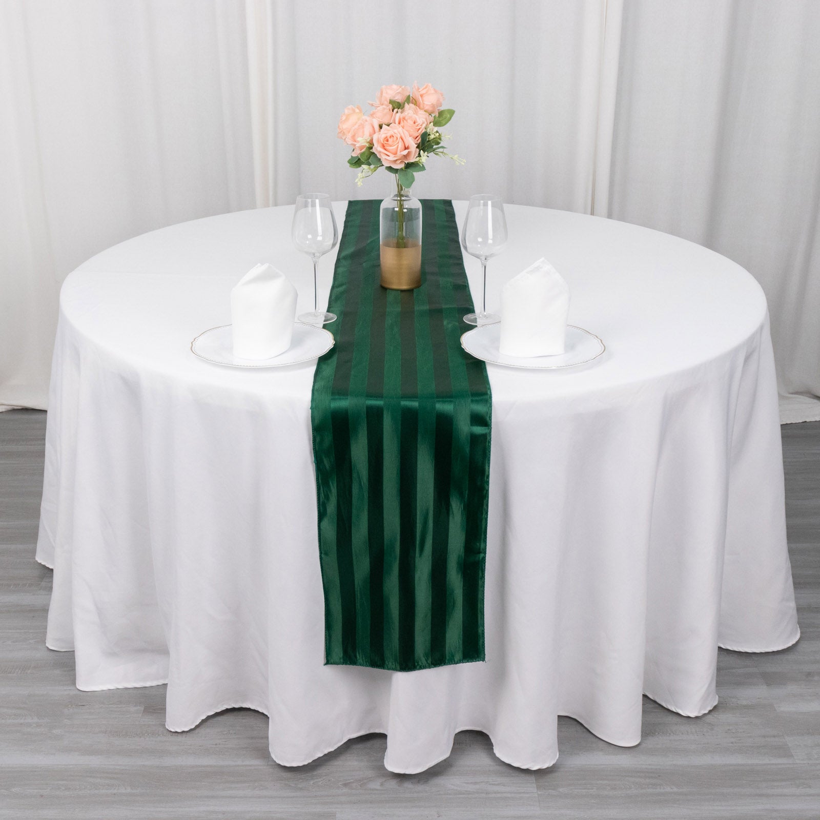 12"x108" Hunter Emerald Green Satin Stripe Table Runner on a round table.