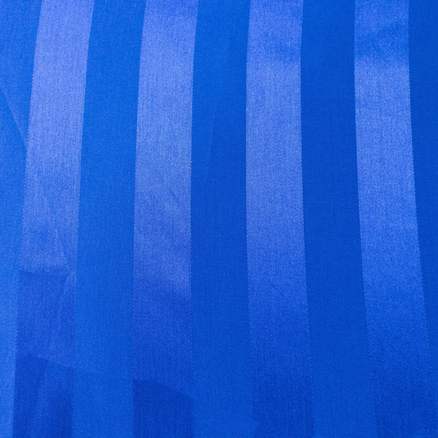 Royal blue satin stripe table runner for elegant dining setups. #whtbkgd