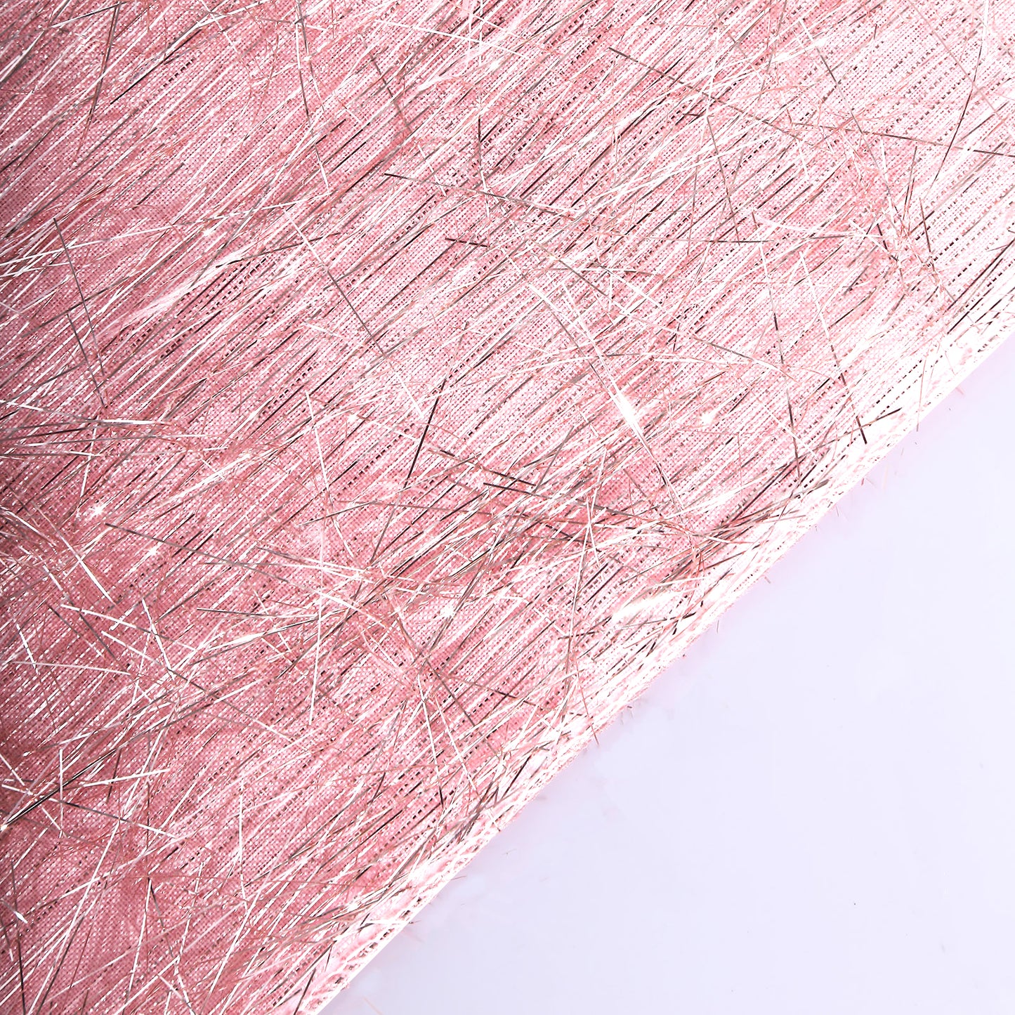 Rose gold metallic fringe tinsel table runner, shimmery polyester.