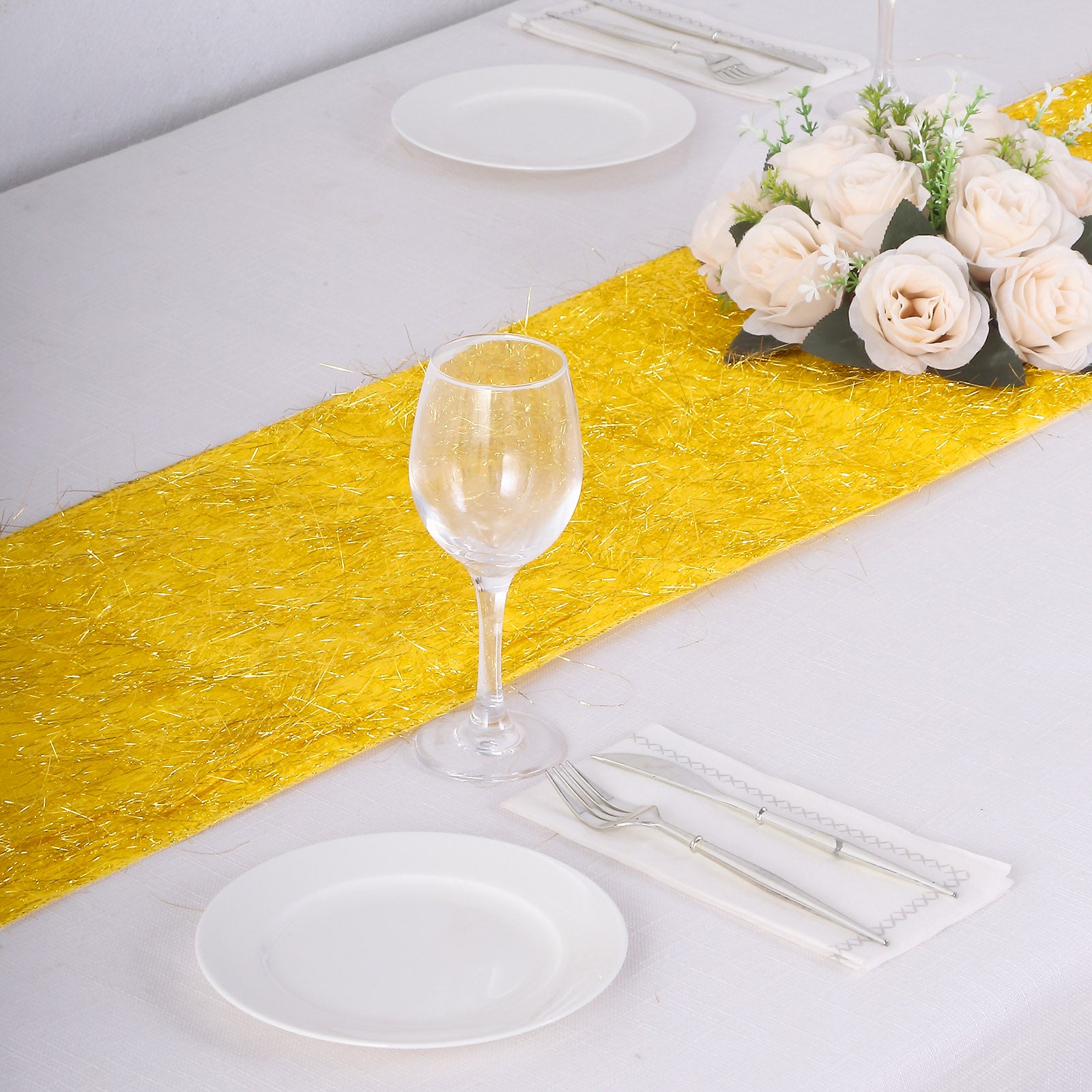 Gold Metallic Fringe Shag Tinsel Table Runner on a white table setting.