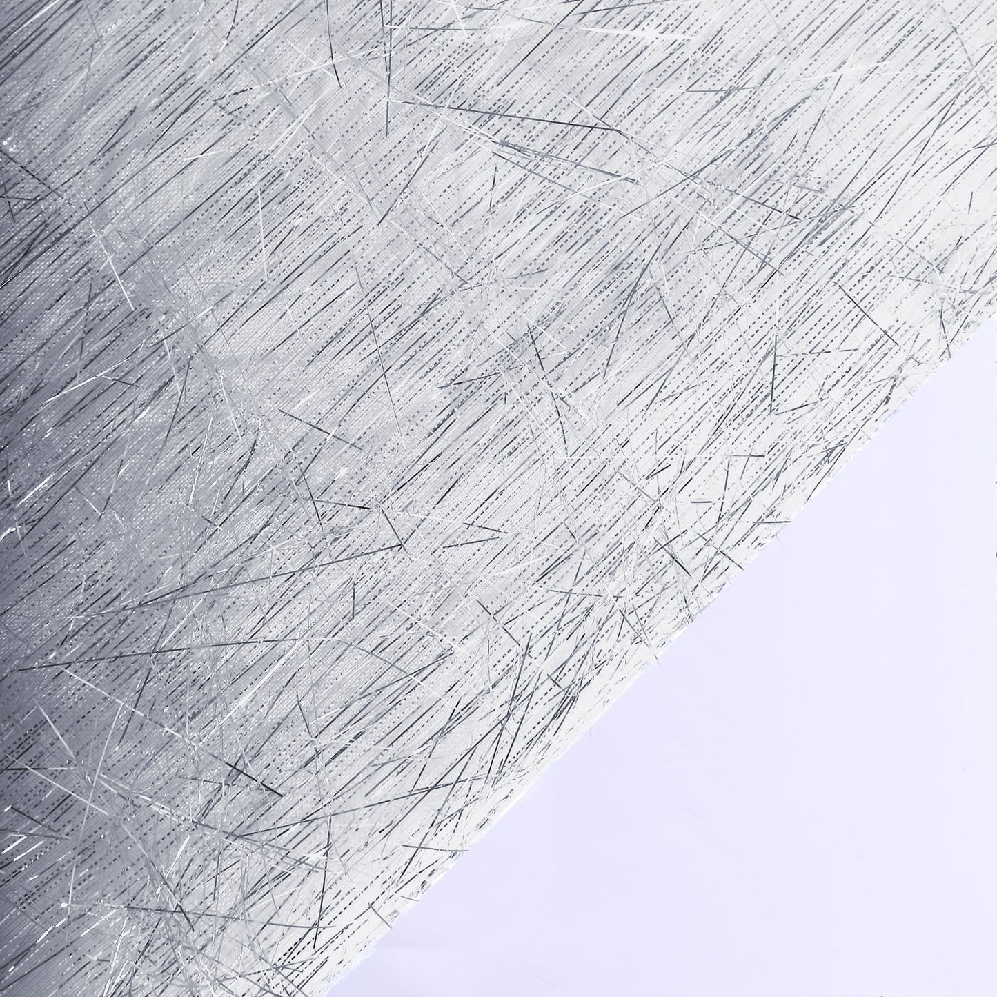 Silver metallic fringe tinsel table runner, 12"x108" in shimmery polyester.