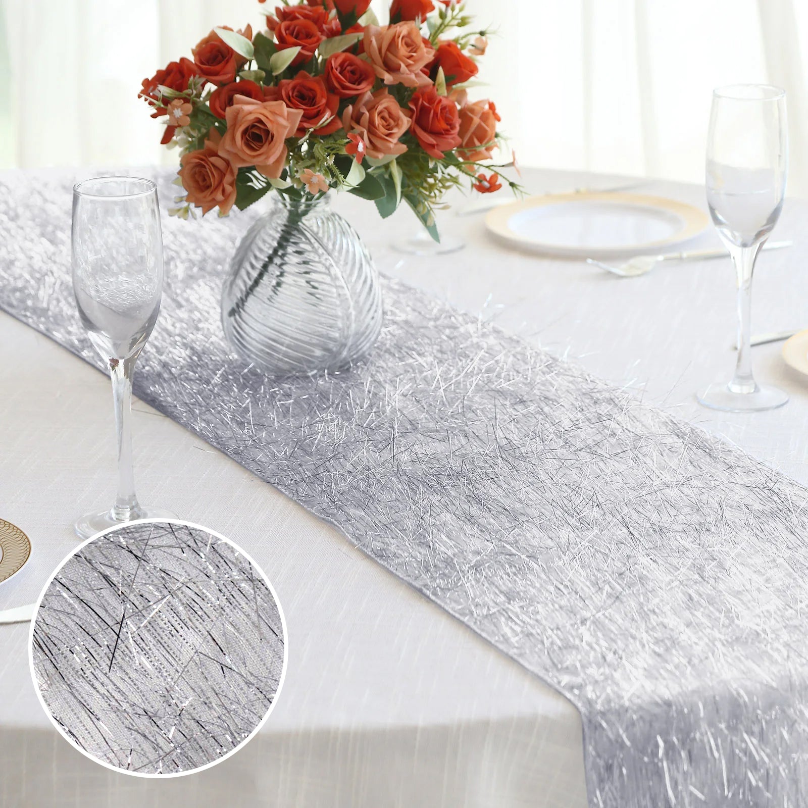 Silver metallic fringe tinsel table runner on a dining table.