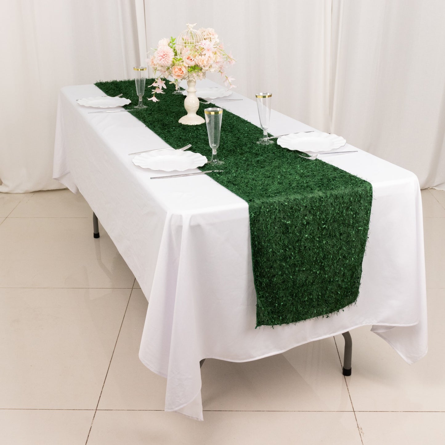 Green shag minky polyester table runner on a white table.
