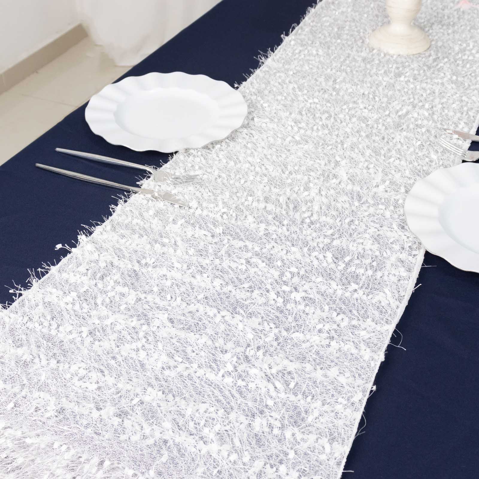 White shag minky polyester table runner on a dark blue table.