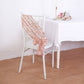 Rose gold geometric sequin chair sash draped elegantly over a white chair.