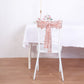 Rose gold geometric sequin chair sash on a white chair.