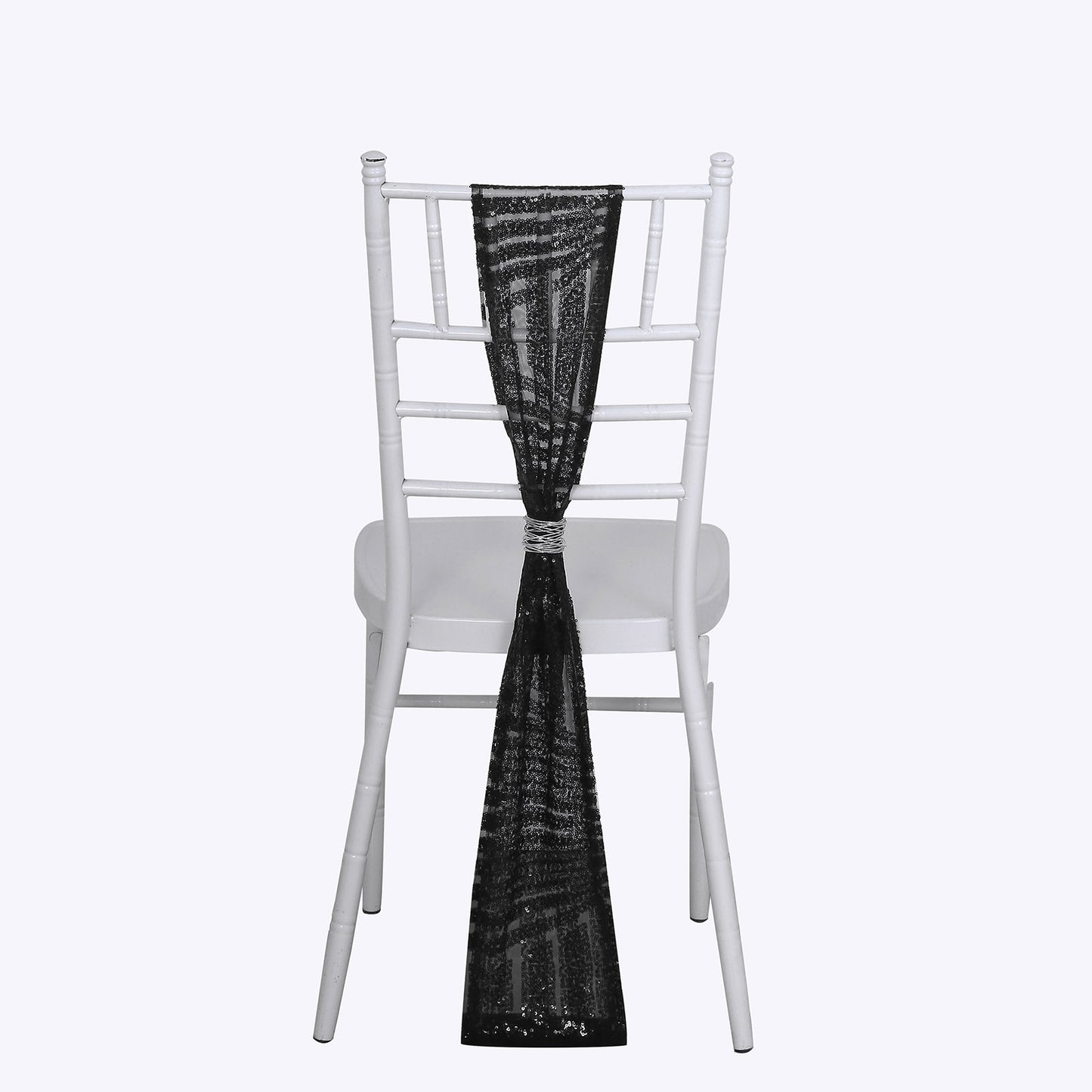 Black geometric diamond glitz sequin chair sash on a white chair.