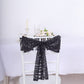 Black geometric diamond glitz sequin chair sash on a white chair.
