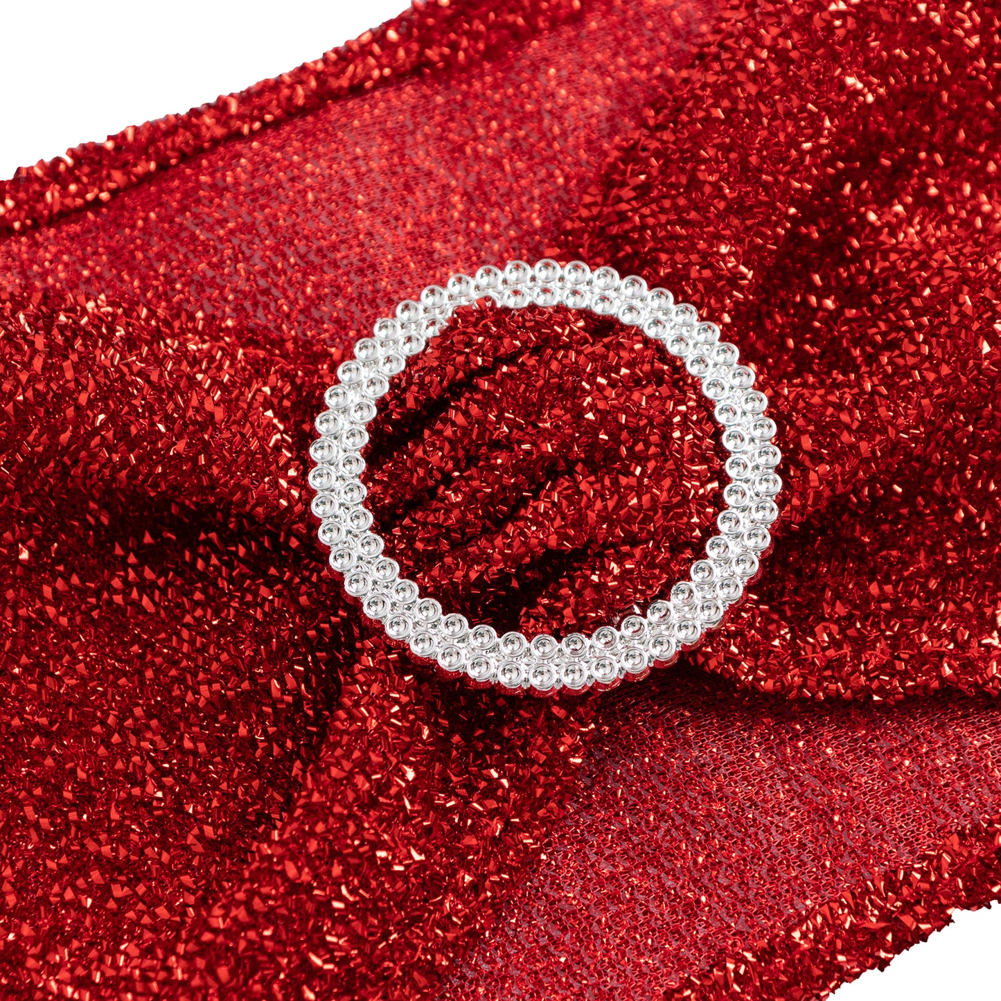 Red shimmer tinsel spandex stretch chair sash with silver rhinestone buckle.