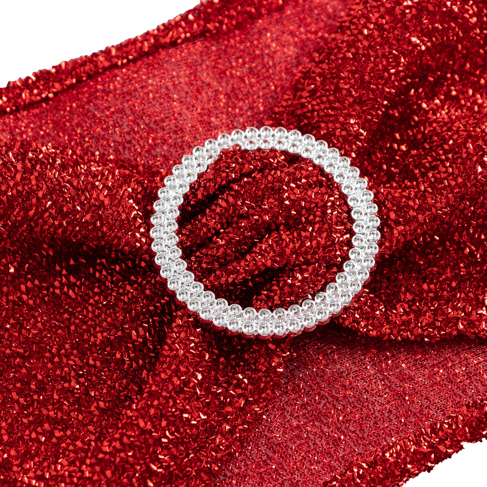 Red shimmer tinsel spandex stretch chair sash with silver rhinestone buckle.
