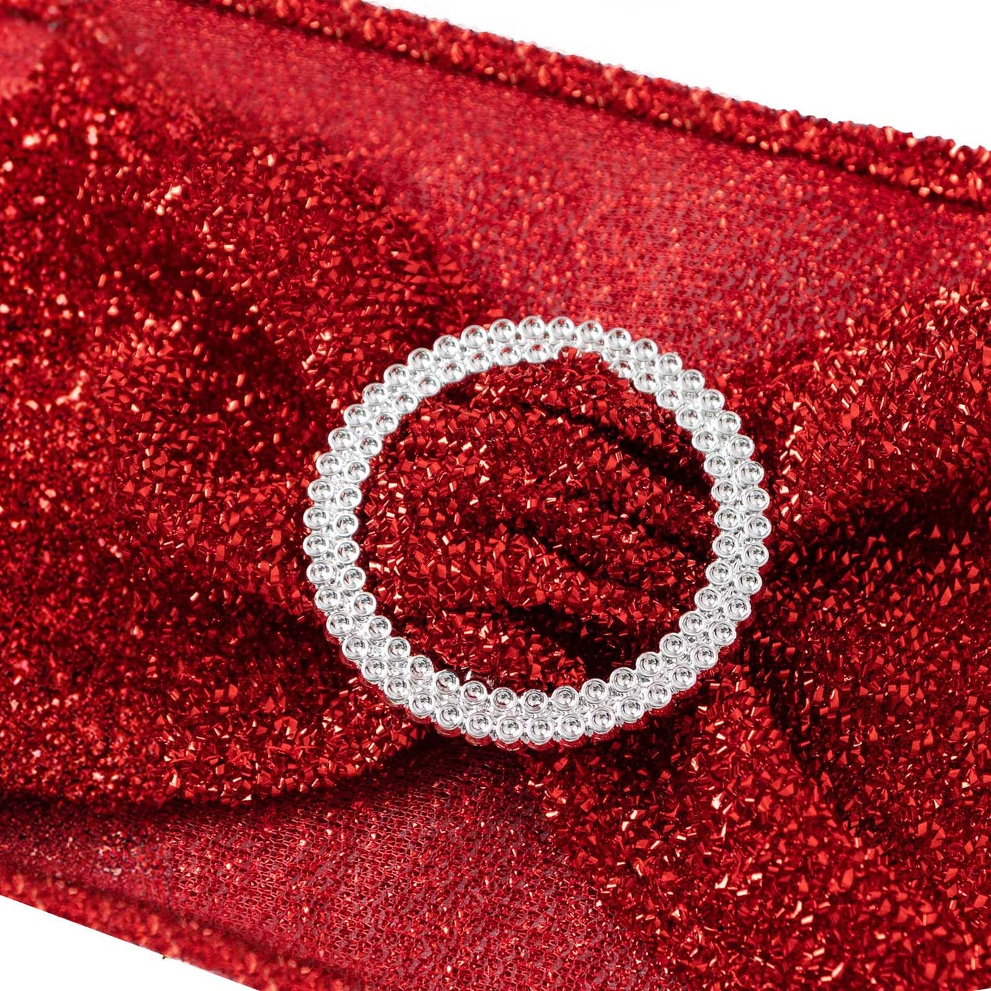 Red shimmer tinsel spandex chair sash with silver rhinestone buckle.