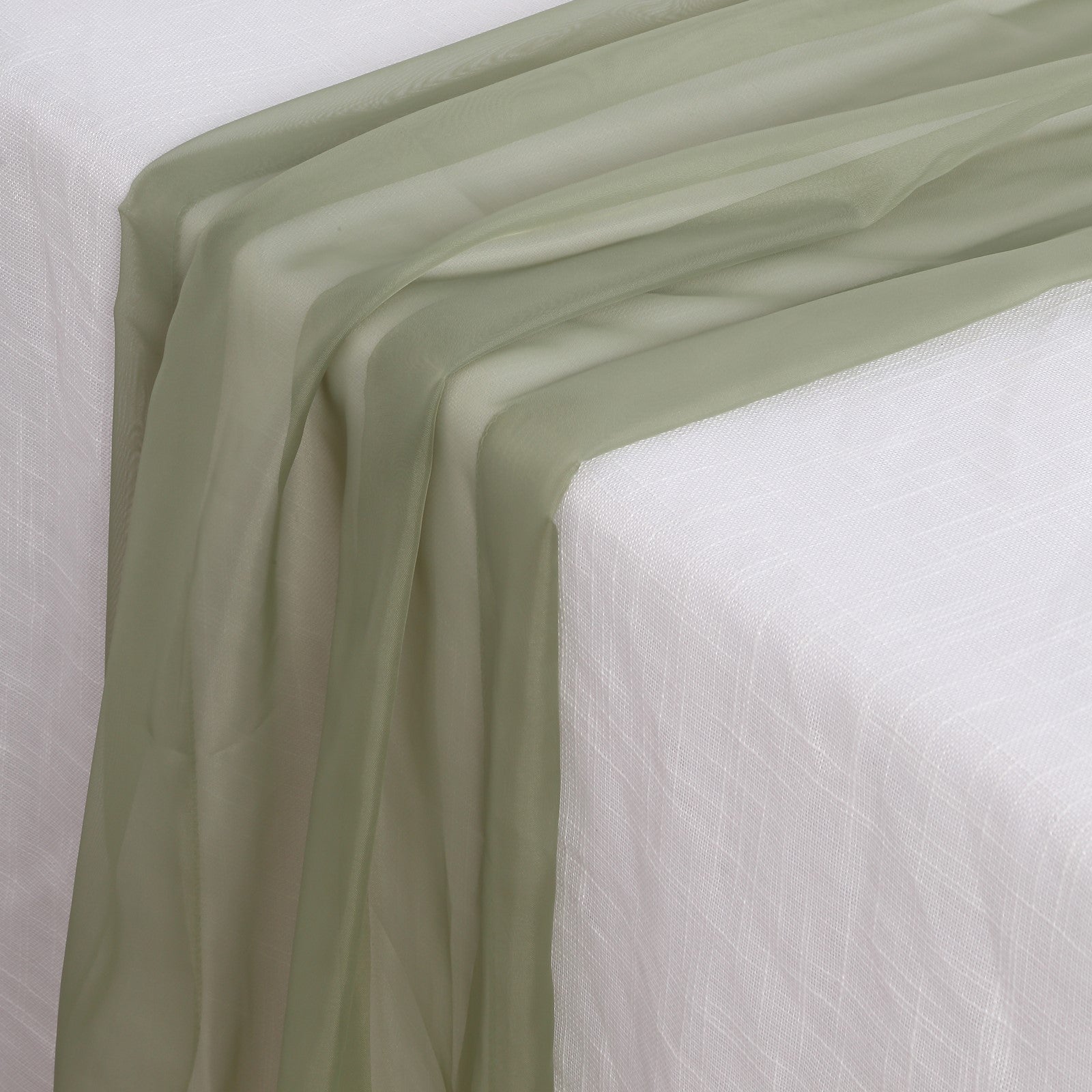 6ft Dusty Sage Green Chiffon Table Runner on a white table.