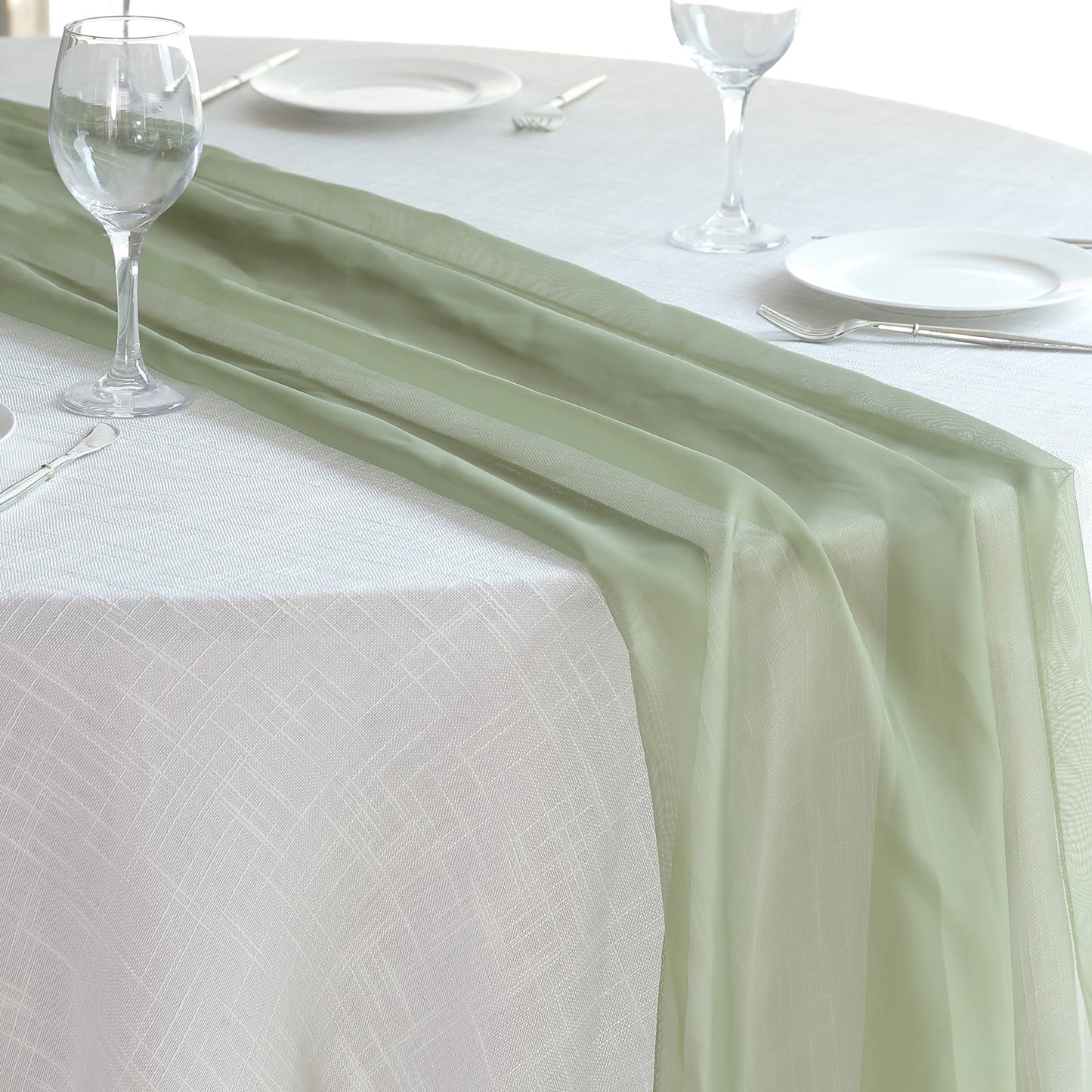 6ft Dusty Sage Green Chiffon Table Runner on a white tablecloth.