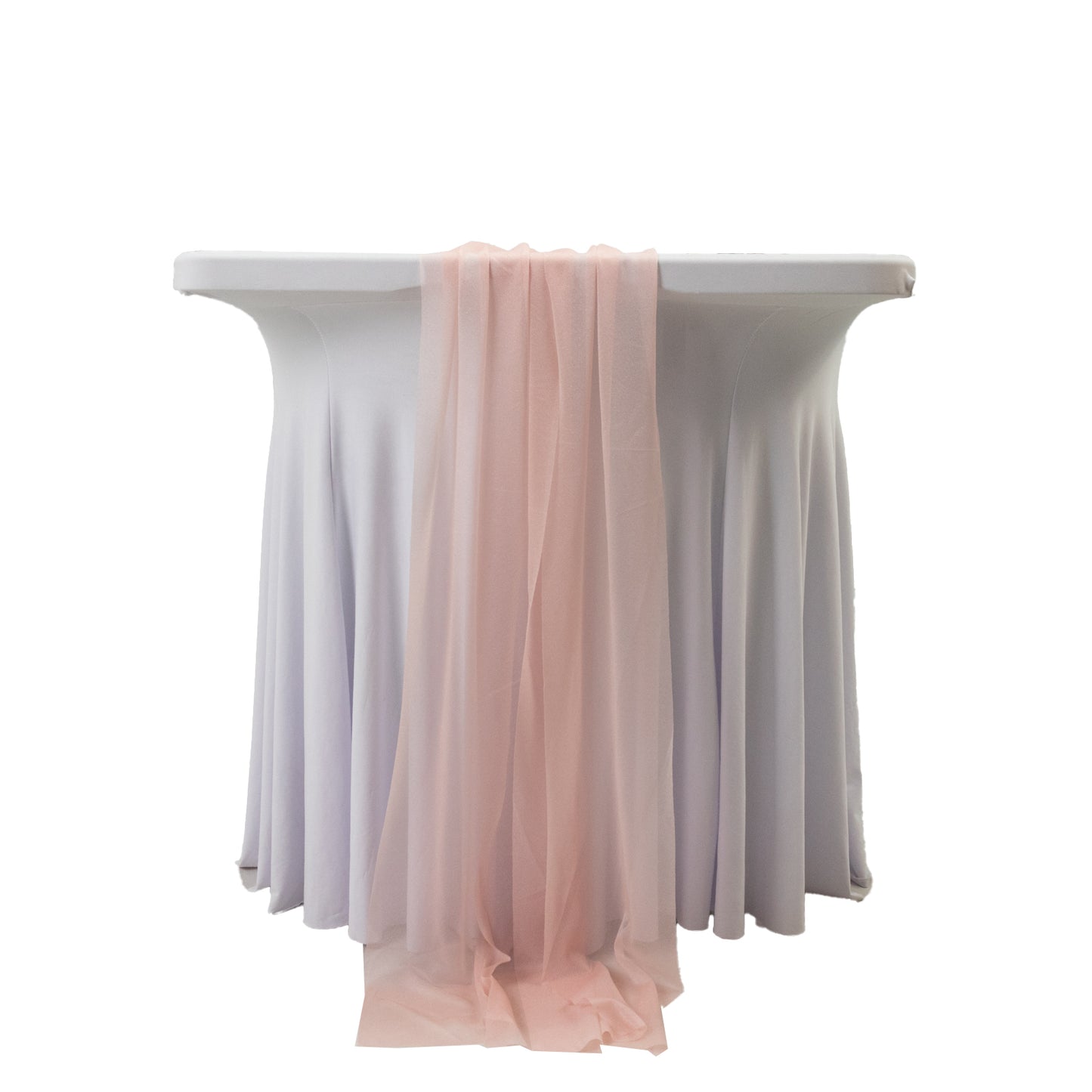 Blush sheer table runner draped over a white table.