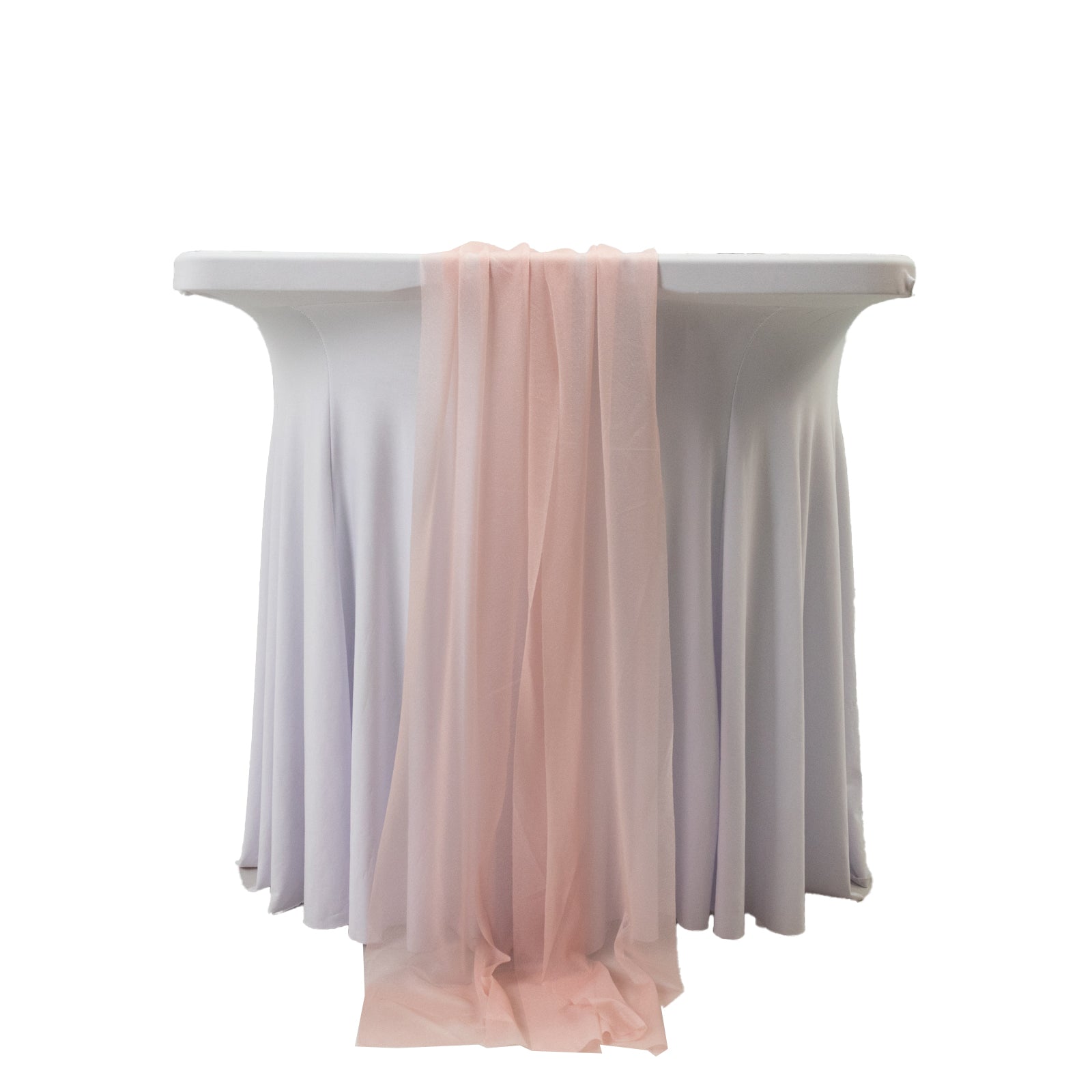 Blush sheer table runner draped over a white table.