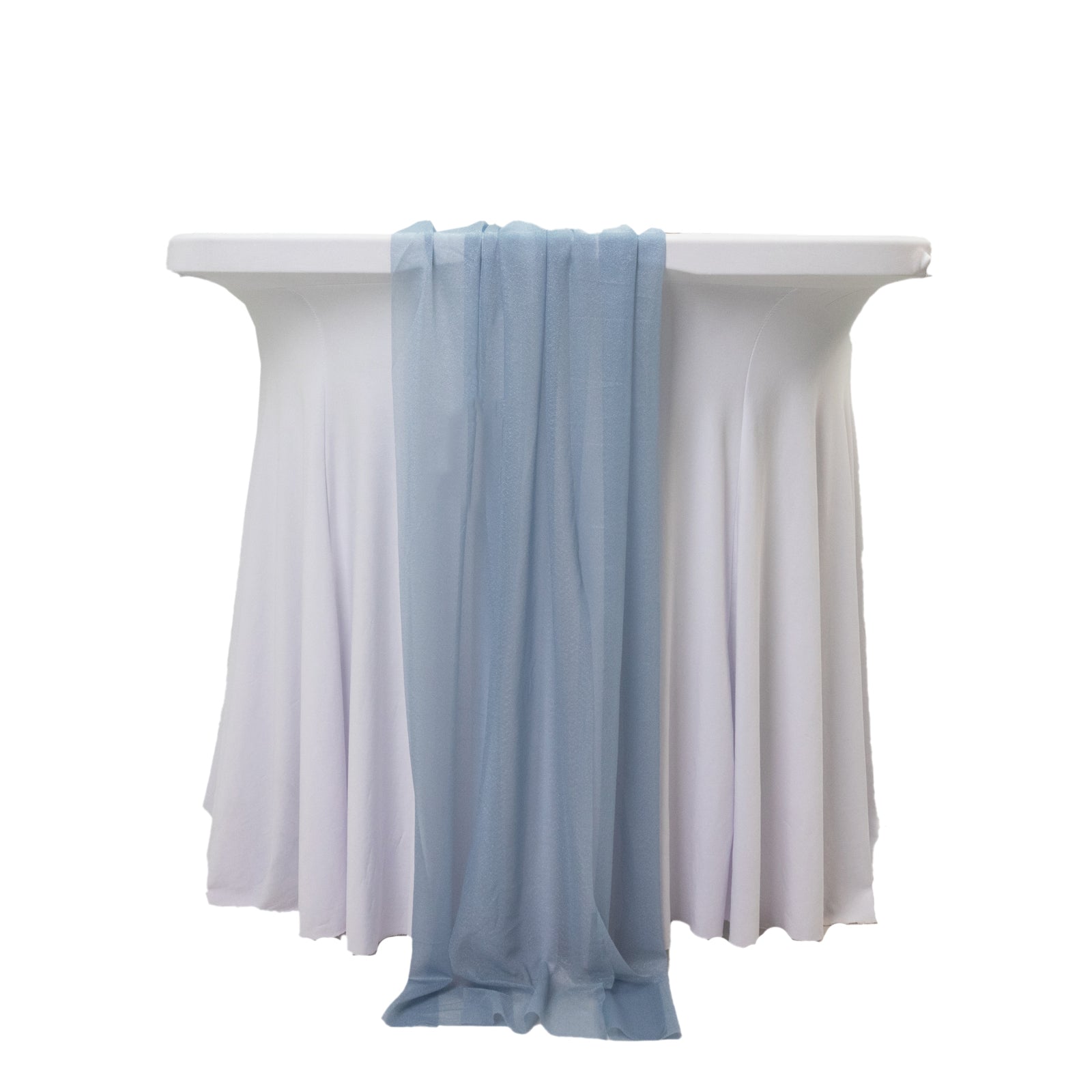 Dusty blue sheer table runner drapes on a white table.
