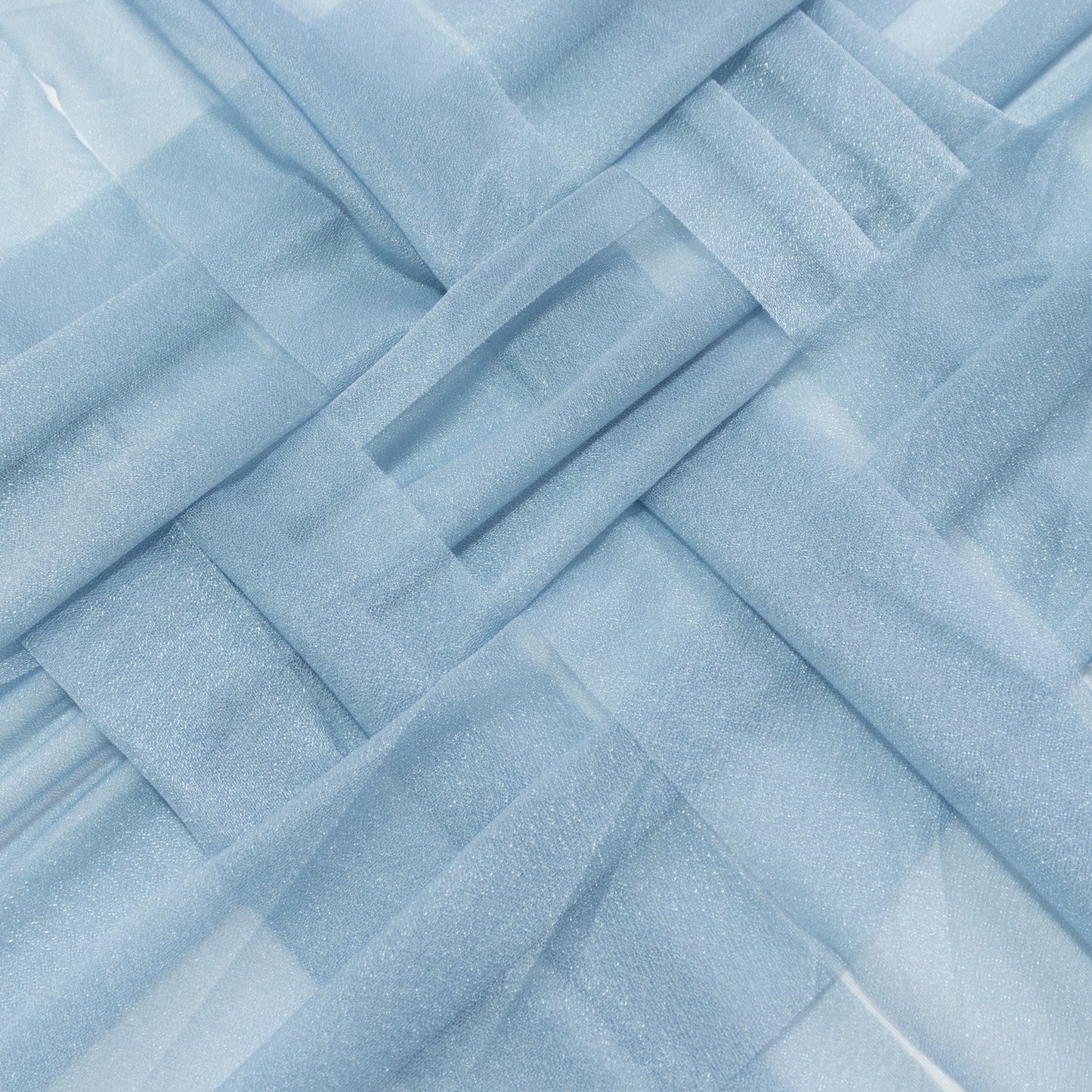 Dusty blue sheer table runners with a shimmer finish, wrinkle-free.