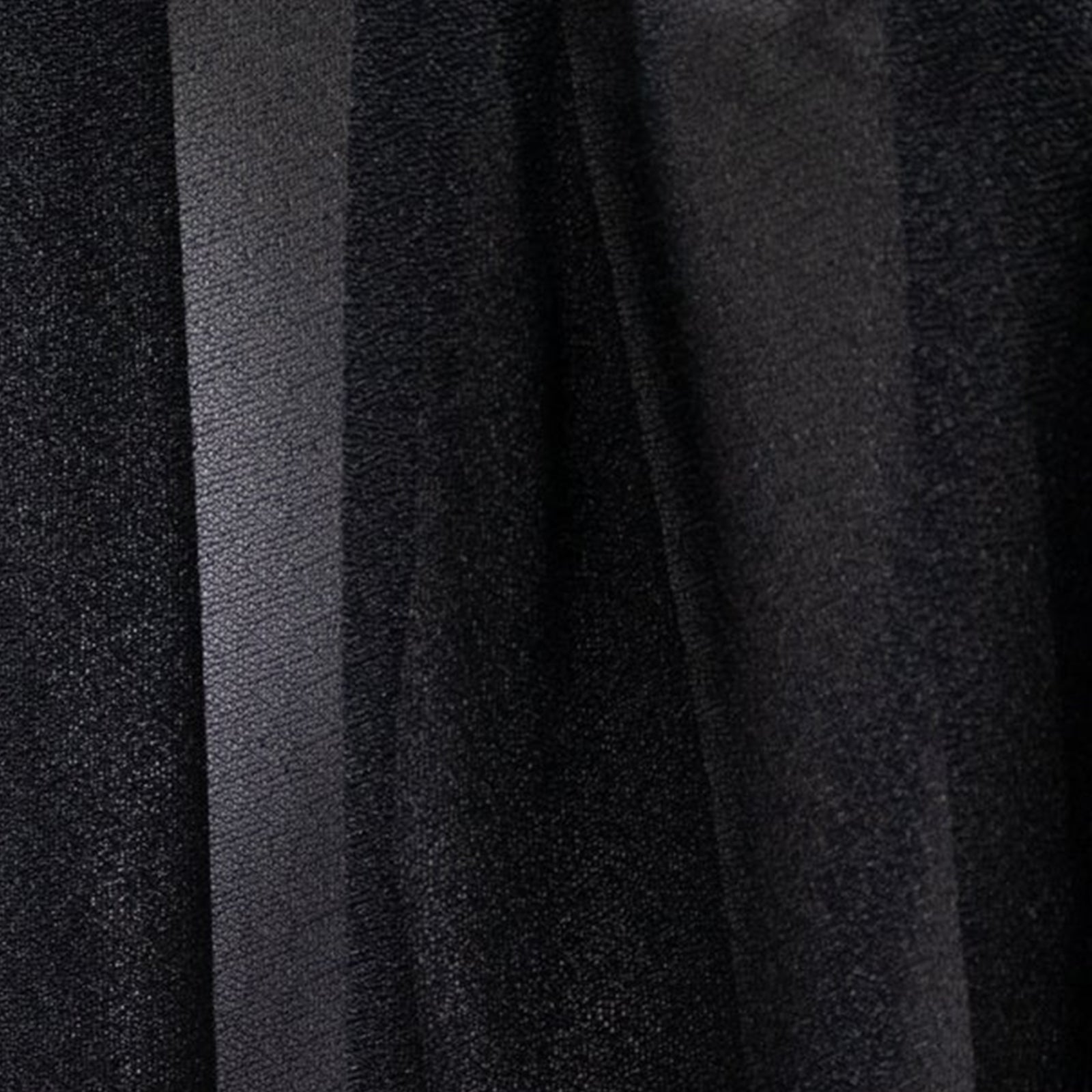 Black sheer chair drape decor with a shimmer finish. #whtbkgd
