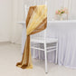 Champagne and gold sheer chair drape sash on a white chair.