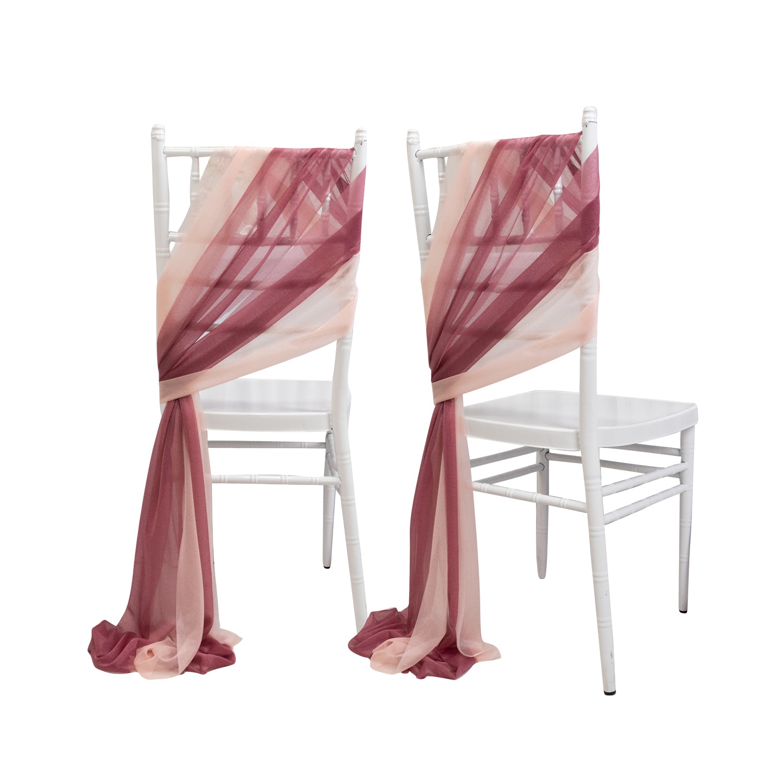 Mauve and blush sheer chair drapes on white chairs.