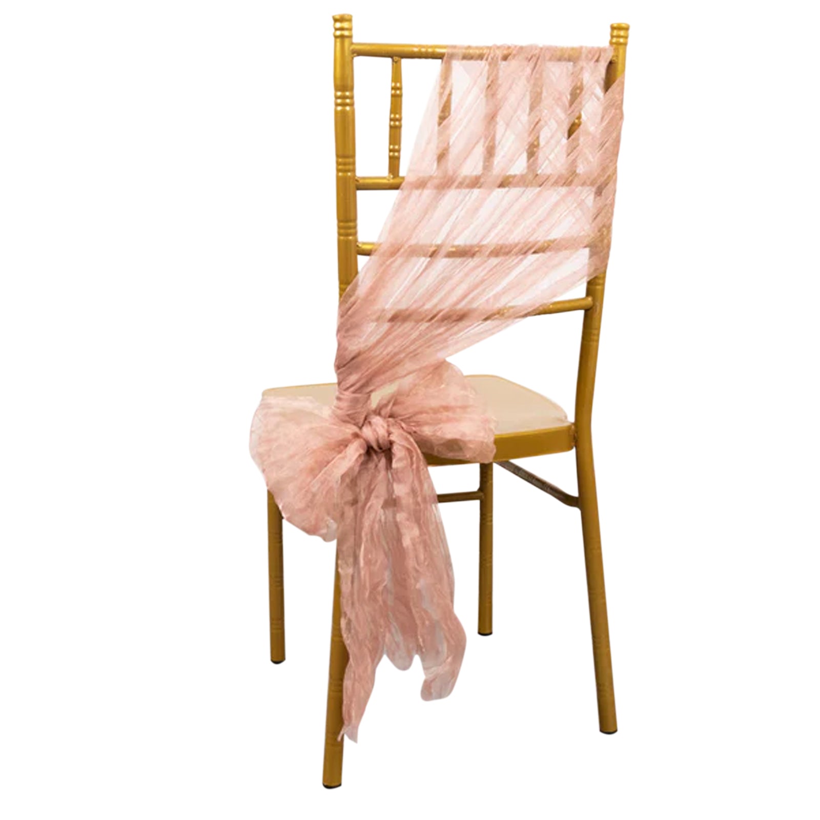 Dusty rose sheer crinkled organza chair sash tied on a gold chair. #whtbkgd
