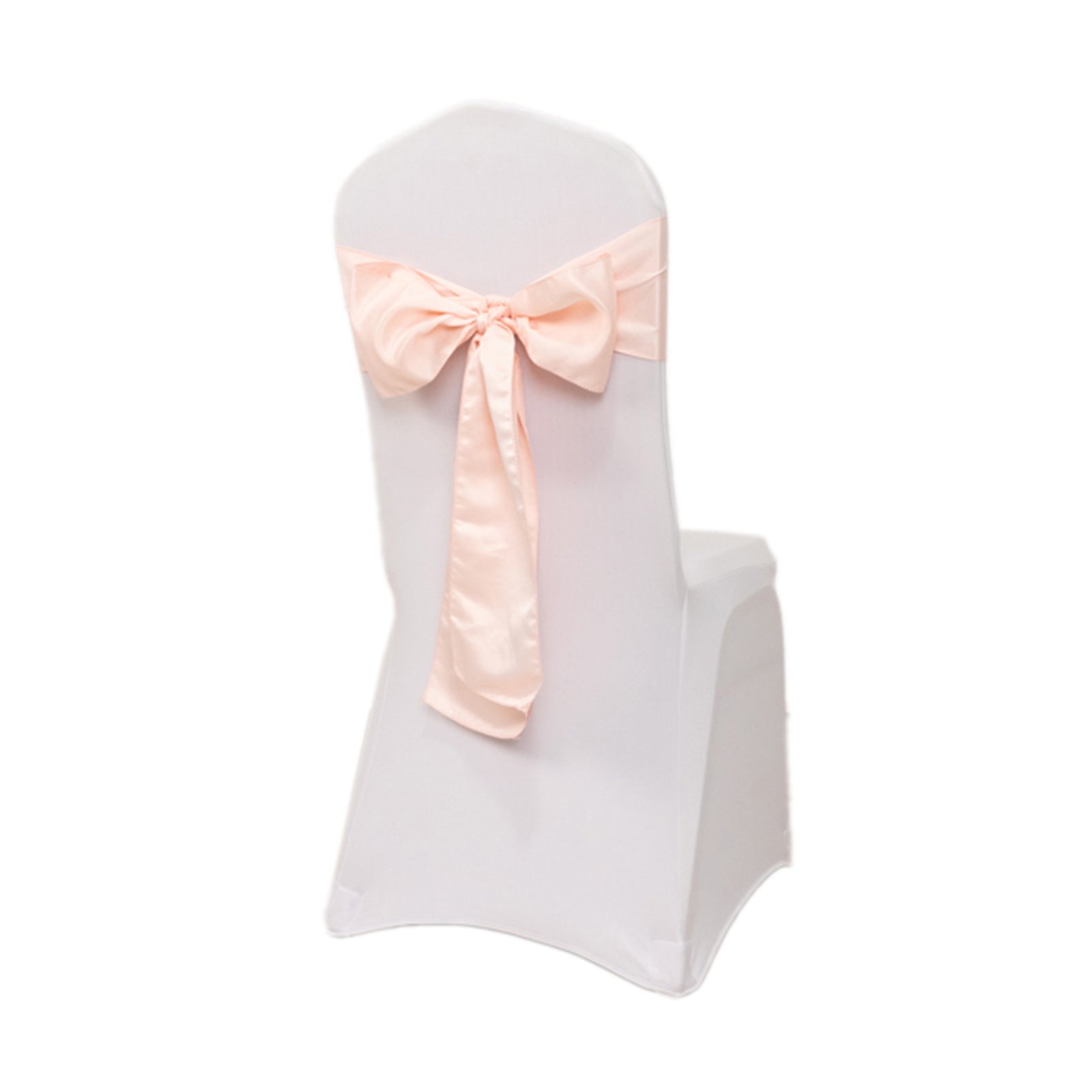 Blush satin chair sash tied in a bow on a white chair.
