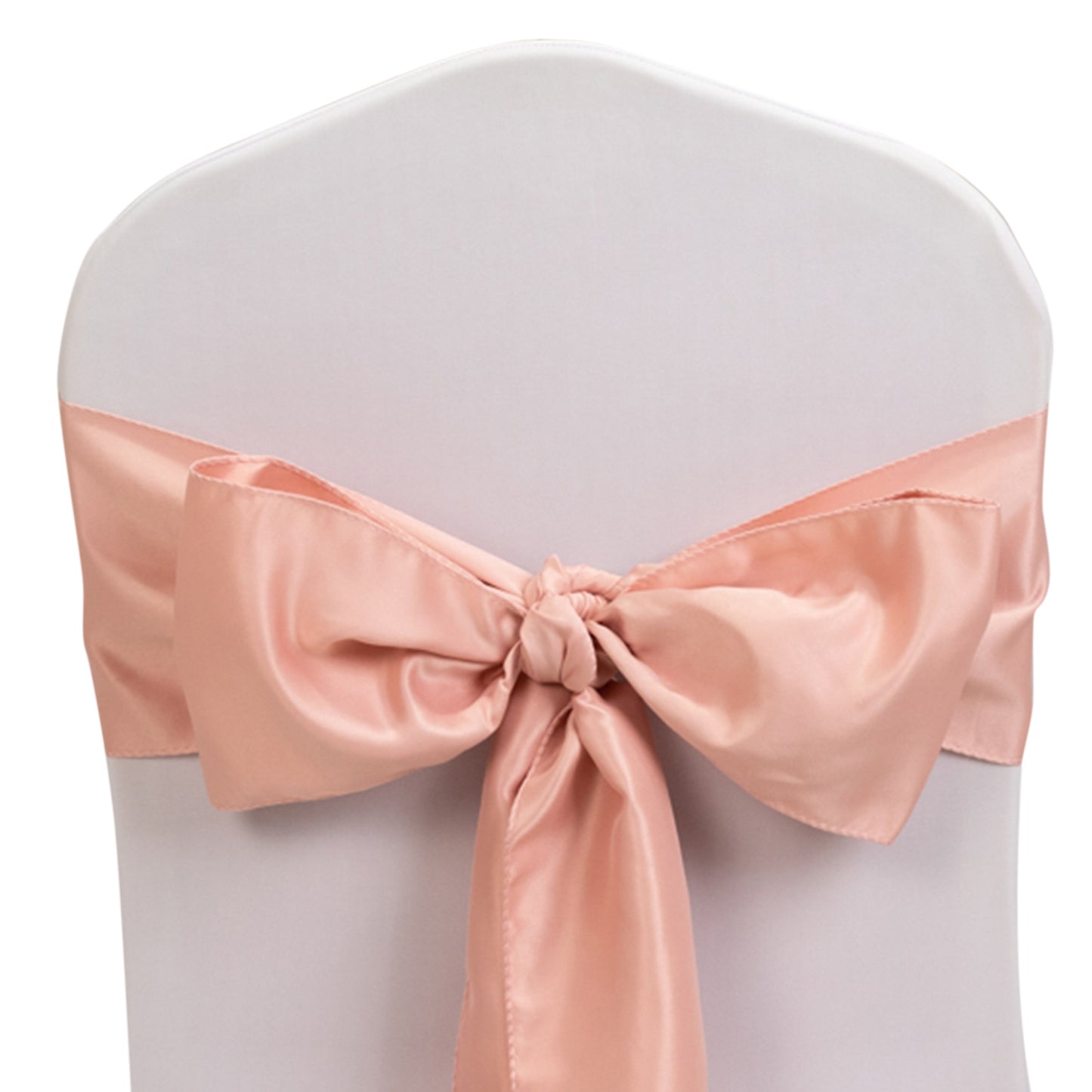 Dusty rose satin chair sash tied in a bow on a white chair.