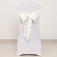 Ivory satin chair sash bow on a white chair.