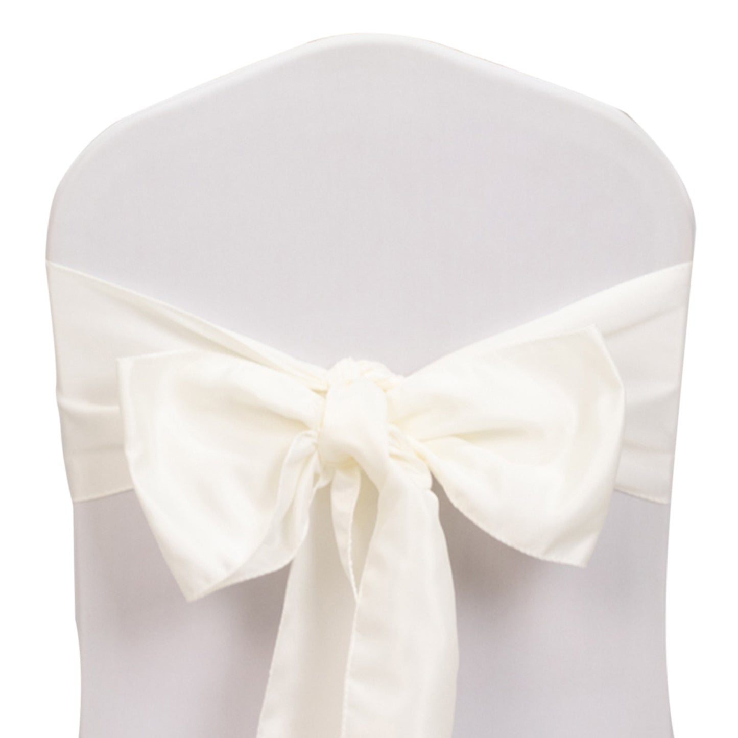 Ivory satin chair sash bow tied on a white chair.